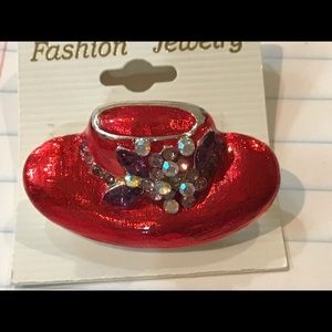 red hat with purple rhinestones silver pin